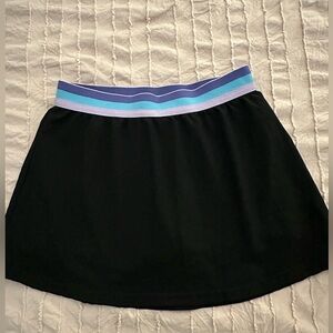Girls athletic skirt with built-in shorts